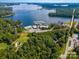 Aerial view of lakefront property with marina and surrounding landscape at 4516 Slanting Bridge Rd, Sherrills Ford, NC 28673