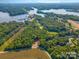 Aerial view of lakefront property with road access and marina at 4516 Slanting Bridge Rd, Sherrills Ford, NC 28673