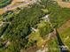 Aerial view of property near lake and residential neighborhood at 4516 Slanting Bridge Rd, Sherrills Ford, NC 28673