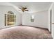 Well-lit bedroom with carpet flooring and large windows at 2511 Old Pond Dr, Lincolnton, NC 28092