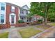 Brick townhome with a charming front porch and landscaping at 4105 Christine Ln # B, Waxhaw, NC 28173