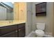 Bathroom with vanity, toilet and wall cabinet at 4105 Christine Ln # B, Waxhaw, NC 28173