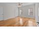 Light-filled bedroom with hardwood floors and double door closet at 4532 Lanstone Sw Ct, Concord, NC 28027