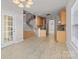 Bright kitchen features ample cabinetry, stainless steel appliances, and an island at 4532 Lanstone Sw Ct, Concord, NC 28027