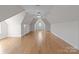 Large bonus room with hardwood floors and plenty of natural light at 4532 Lanstone Sw Ct, Concord, NC 28027