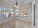 Charming breakfast nook boasts tile flooring and abundant natural light at 4532 Lanstone Sw Ct, Concord, NC 28027
