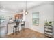Eat-in kitchen with breakfast bar, pendant lighting, and hardwood floors at 12009 Downy Birch Rd, Charlotte, NC 28227