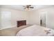 Main bedroom with plush carpet, dresser, and ensuite bathroom access at 12009 Downy Birch Rd, Charlotte, NC 28227