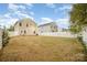 Large backyard with grassy area and privacy fence at 12009 Downy Birch Rd, Charlotte, NC 28227