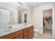 Double vanity bathroom with walk-in shower and large closet at 12009 Downy Birch Rd, Charlotte, NC 28227