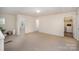 Upstairs laundry area with washer, dryer, and extra storage at 12009 Downy Birch Rd, Charlotte, NC 28227