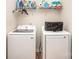 Laundry room with washer, dryer, and storage at 12009 Downy Birch Rd, Charlotte, NC 28227