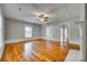 Spacious bedroom with hardwood floors, fireplace and ceiling fan at 203 Kings Mountain St, Clover, SC 29710