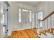 Bright entryway with hardwood floors and staircase at 203 Kings Mountain St, Clover, SC 29710