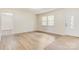 Living room with new laminate flooring and fresh paint at 3500 Eller Dr, Newton, NC 28658