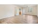 Bright living room features wood-look floors and access to kitchen at 3500 Eller Dr, Newton, NC 28658