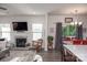 Living room with fireplace and hardwood floors at 145 Beacon Dr # F, Mooresville, NC 28117