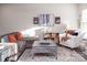 Spacious living room with sectional sofa and coffee table at 145 Beacon Dr # F, Mooresville, NC 28117