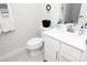 Clean bathroom with white vanity and gray tile floor at 145 Beacon Dr # F, Mooresville, NC 28117