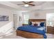 Spacious main bedroom with a large bed, nightstands and ceiling fan at 145 Beacon Dr # F, Mooresville, NC 28117