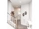 Bright entryway with hardwood floors and staircase at 145 Beacon Dr # F, Mooresville, NC 28117