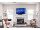 Living room with fireplace and built-in shelving at 145 Beacon Dr # F, Mooresville, NC 28117