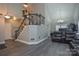 Spacious living area with vaulted ceilings and gray floors at 135 Southhaven Dr, Mooresville, NC 28117