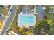 Aerial view of community pool with surrounding landscaping at 5015 Mockernut Ln, Indian Land, SC 29707