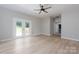 Bright living room with hardwood floors and French doors leading to deck at 126 Jason Ln, Mooresville, NC 28115