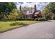 Brick home with landscaped yard and driveway at 424 S College Ave, Newton, NC 28658