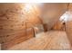 Unfinished attic space with wood floors and ample storage at 424 S College Ave, Newton, NC 28658
