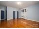 Spacious bedroom with hardwood floors and two closets at 424 S College Ave, Newton, NC 28658