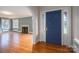 Home entry with hardwood floors and blue door at 424 S College Ave, Newton, NC 28658