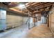 Unfinished basement with high ceilings and ample storage space at 424 S College Ave, Newton, NC 28658