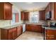 Kitchen with wood cabinets and stainless steel appliances at 424 S College Ave, Newton, NC 28658