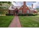 Brick home with walkway and landscaping at 424 S College Ave, Newton, NC 28658