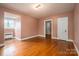 Spacious bedroom with hardwood floors and ample natural light at 424 S College Ave, Newton, NC 28658