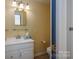 Clean bathroom with vanity, toilet and shower/tub at 424 S College Ave, Newton, NC 28658