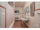 Bathroom with vintage tile and a classic sink and tub at 424 S College Ave, Newton, NC 28658
