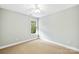 Light and airy bedroom with carpet and window offering natural light at 9942 Linksland Dr, Huntersville, NC 28078