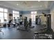Community fitness center with various cardio and strength training equipment at 12817 Mayes Rd, Huntersville, NC 28078