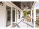 Covered porch with ceiling fan and view of neighborhood at 0001 Bolton Rd, Catawba, NC 28609