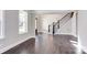 Open concept living room with hardwood floors and a view of the staircase at 0001 Bolton Rd, Catawba, NC 28609