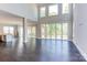 Open great room with high ceilings, hardwood floors, and access to a deck at 0001 Bolton Rd, Catawba, NC 28609