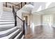 Spacious living room with hardwood floors and a stunning staircase at 0001 Bolton Rd, Catawba, NC 28609
