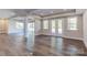 Bright, open basement showcasing hardwood floors and multiple access points at 0001 Bolton Rd, Catawba, NC 28609