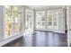 Sunlit home office boasts hardwood floors and multiple windows offering ample natural light at 0001 Bolton Rd, Catawba, NC 28609