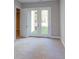 Basement room with carpet, door to outside, and neutral walls at 0001 Bolton Rd, Catawba, NC 28609