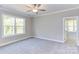 Bright bedroom with window and neutral carpeting at 0001 Bolton Rd, Catawba, NC 28609