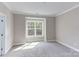 Spacious bedroom with a large window and neutral carpeting at 0001 Bolton Rd, Catawba, NC 28609